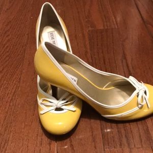 Yellow and white tie pumps